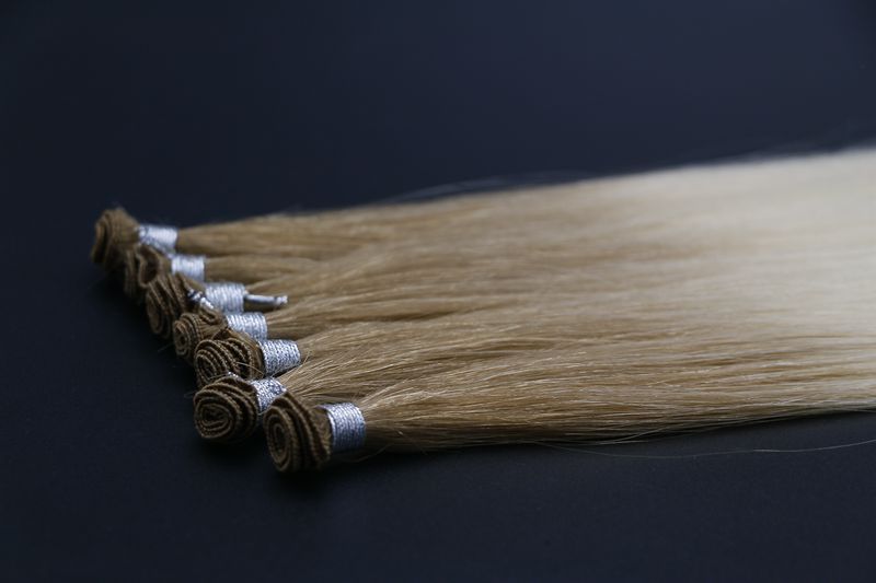 Rooted handtied weft extensions