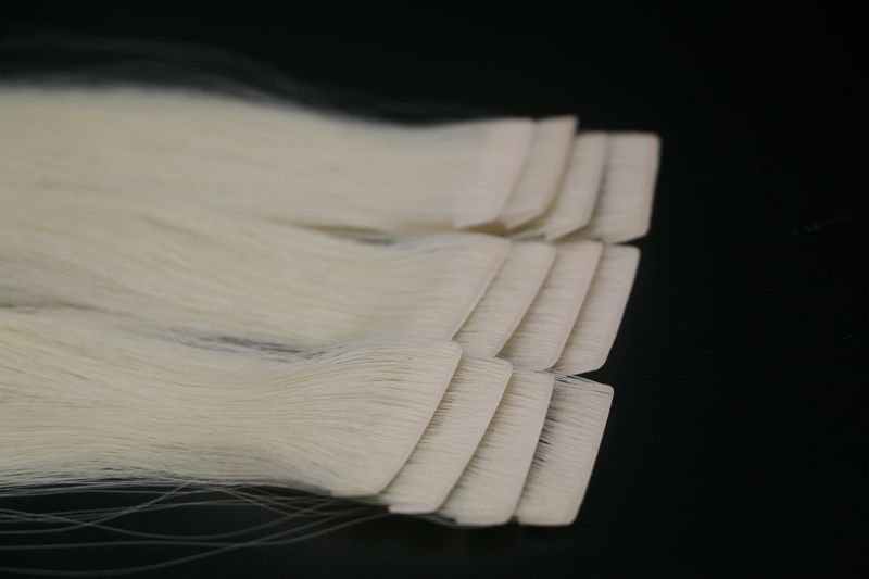 Ultra blonde invisible tape hair extensions
