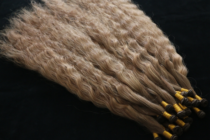 Curly hand-tied weft hair factory in China
